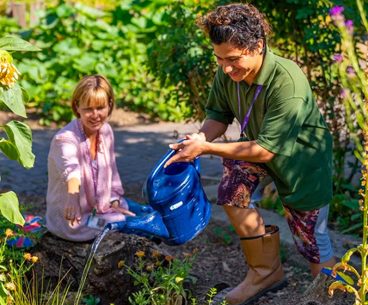 two women working in a garden